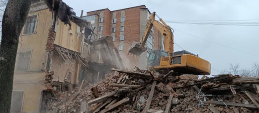 Промышленный снос и демонтаж зданий спецтехникой стоимость услуг и где заказать - Мурманск